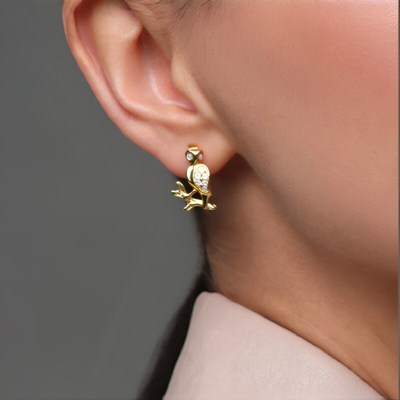 Gouden oorbellen met I1 (H) Diamanten