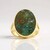 Anello in argento con Legno pietrificato opalizzato (Bali Barong)