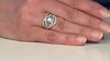 Zilveren ring met een Paraiba kleurige smaragd