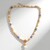 Collana in argento con Perla Ming color Pesca (TPC)
