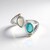 Anello in argento con Opale Blu dell'Etiopia (Granulieren)