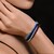 Zilveren armband met magenta granaten