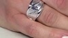 Zilveren ring met een onverhitte lila tanzaniet