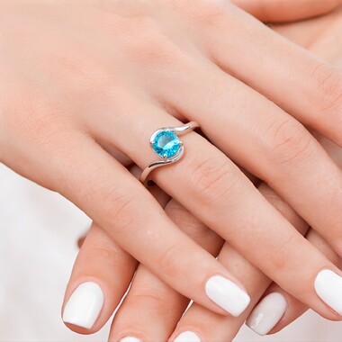 Anillo en plata con Topacio color Paraiba