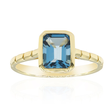Anillo en oro con Topacio azul de Londres