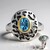 Anello in argento con Topazio Blu Svizzero (Remy Rotenier)