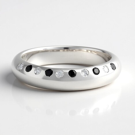 Anello in argento con Zaffiro Bianco e Spinello Nero