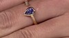 Gouden ring met een AAA tanzaniet