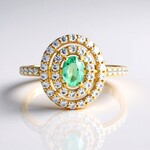 Bague en or et Émeraude de couleur Paraiba