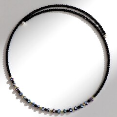 Collana rigida in acciaio con Perla Nera di Acqua Dolce (Riya)