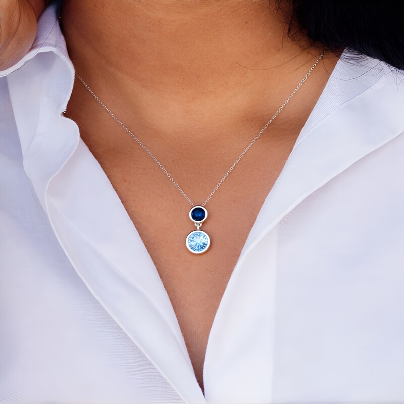 Colgante en plata con Topacio azul cielo