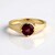 Zilveren ring met een magenta granaat