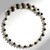 Collana rigida in acciaio con Perla Nera di Acqua Dolce (Riya)