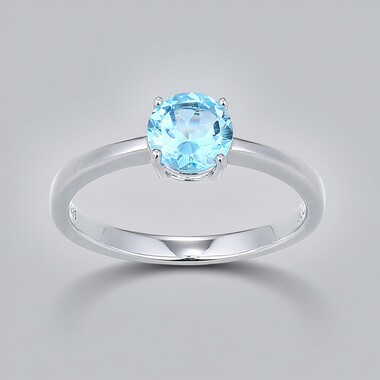 Anillo en plata con Topacio azul suizo