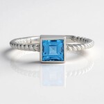 Bague en argent et Topaze bleu Suisse
