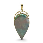 Pendentif en argent et Bois pétrifié opalisé (Bali Barong)