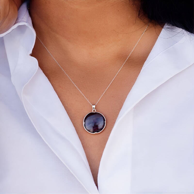 Colgante en plata con Madera de palma petrificada