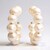 Boucles d'oreilles en argent et Perle blanche de culture d'eau douce (Joias do Paraíso)