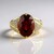 Anello in oro con Granato Essonite
