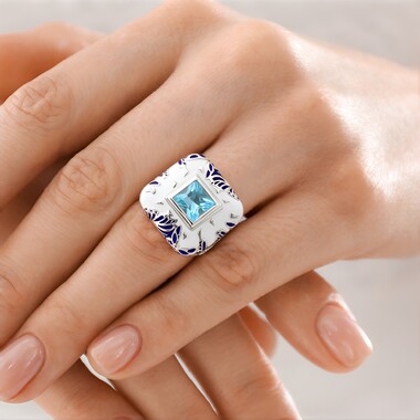 Pierścionek ze srebra platynowanego - Topaz błękitny Sky Blue (Adela Silber)