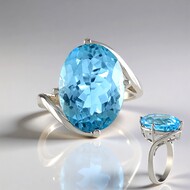 Zilveren ring met een hemel-blauwe topaas