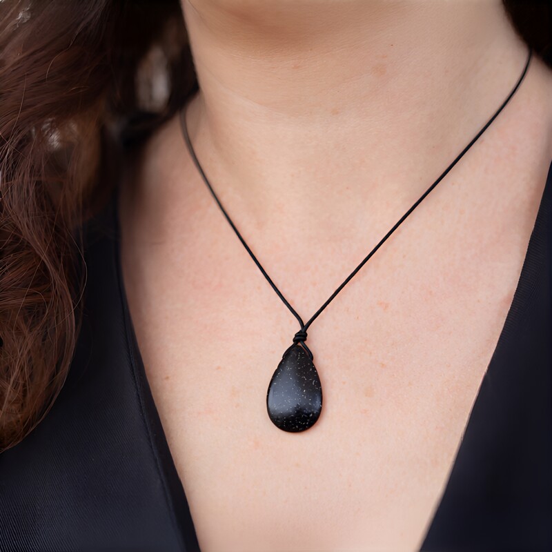 Versteinertes Palmenholz-Collier (Bali Barong)