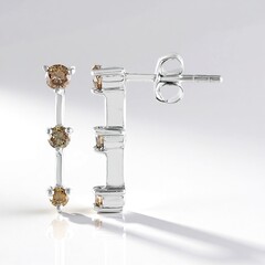 Orecchini in argento con Diamante Champagne I2