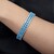 Brazalete en plata con Topacio azul suizo