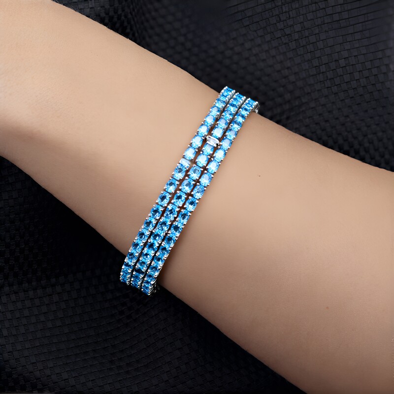 Brazalete en plata con Topacio azul suizo
