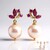 Boucles d'oreilles en argent et Perle Ming de couleur pourpre (TPC)