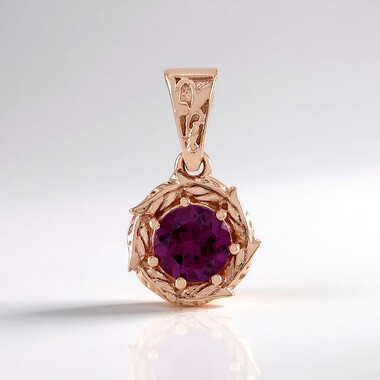 Zilveren hanger met een magenta granaat