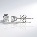 Orecchini in oro con Diamante I1 (H) (CIRARI)