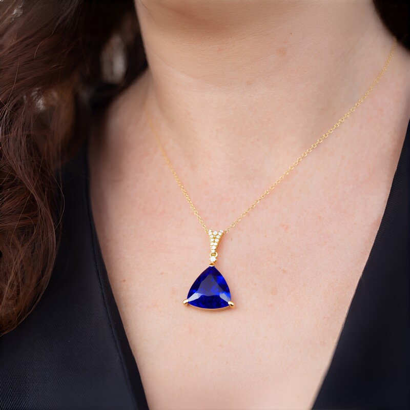 Gouden halsketting met een AAA tanzaniet (CIRARI)