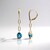 Pendientes en oro con Topacio azul de Londres (CIRARI)