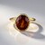 Anello in oro con Granato Essonite