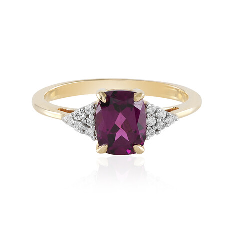 Gouden ring met een magenta granaat