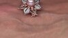 Zilveren broche met een paarse Ming parel (TPC)