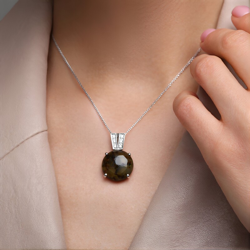 Zilveren hanger met een dinosaurus kwarts