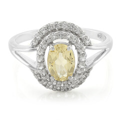 Zilveren ring met een gele beril