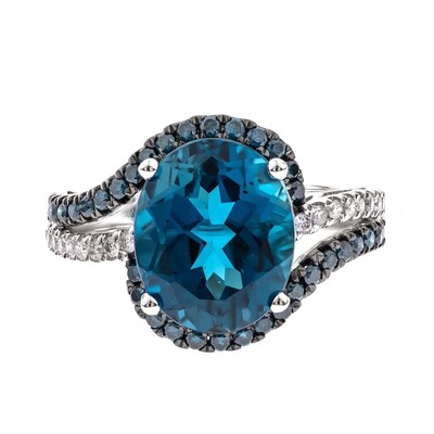 Gouden ring met een Londen-blauwe topaas