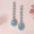 Himmelblauer Topas-Silberohrringe