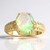 Anello in oro con Opale di Mintabie (AMAYANI)