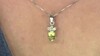 Zilveren hanger met een Ouro Verde kwarts