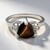 Anello in argento con Occhio di Tigre Rosso