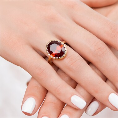 Anillo en oro con Granate Hesonita