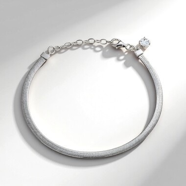 Zilveren armband met een witte topaas