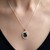 14K Ludwigite Peridot Gold Pendant (de Melo)