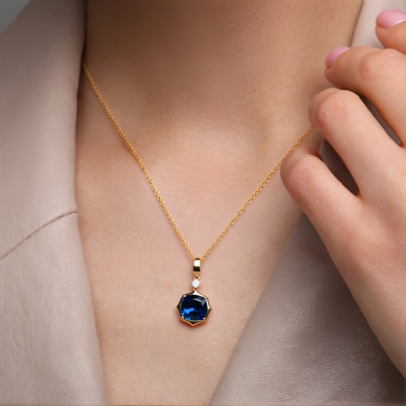 Collar en oro con Topacio azul de Londres (CIRARI)