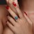 Blauer I2 Brillant-Silberring