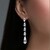 Boucles d'oreilles en argent et Topaze blanche